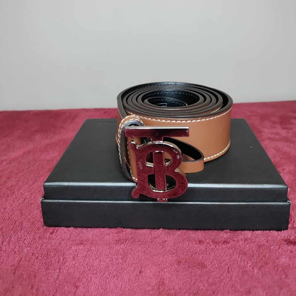 Used Brown leather Burberry belt, w/ contrast stitching, size 38